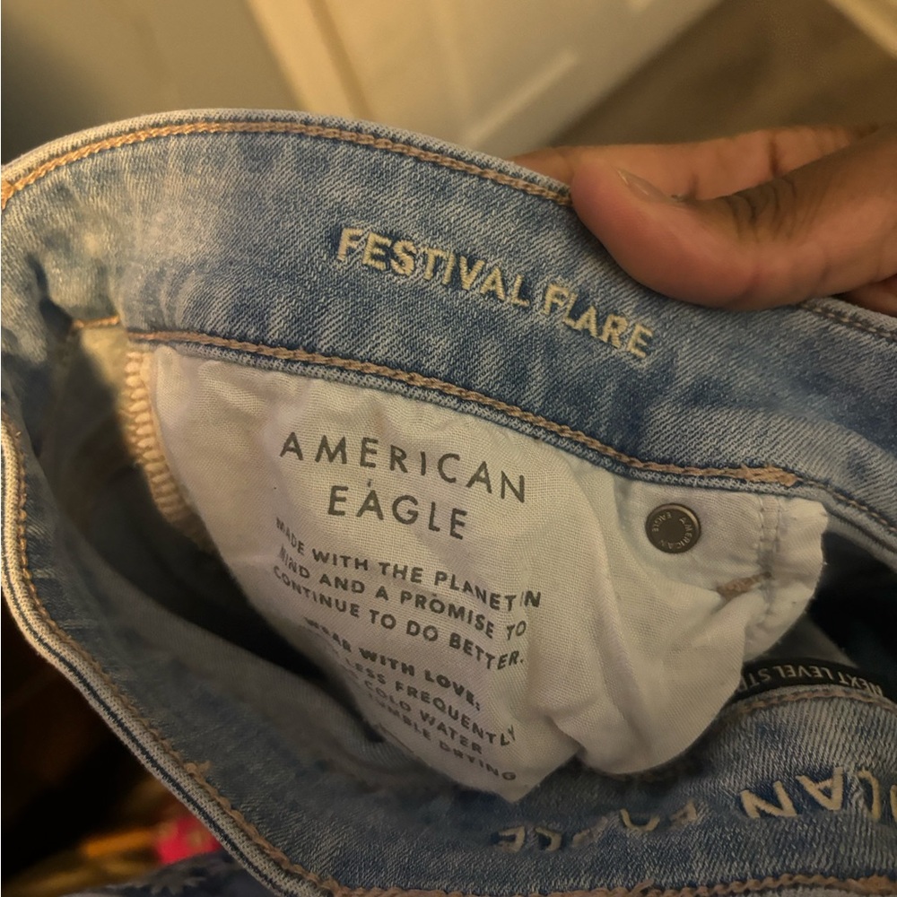 American Eagle Outfitters Light Blue Distressed Flare Jeans - Picture 5 of 5